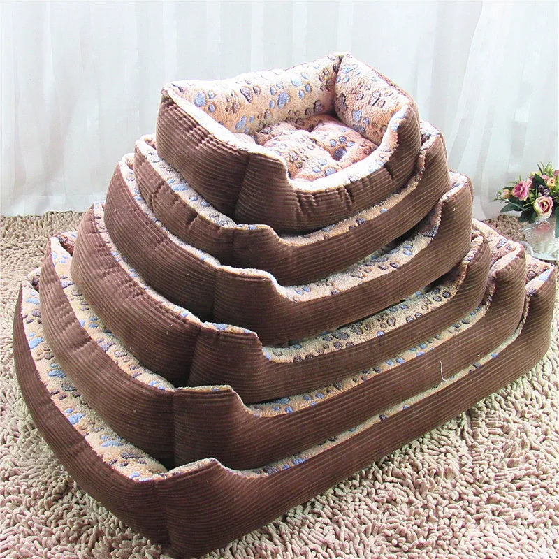 Beige soft plush dog bed with raised edges shown in a home setting.