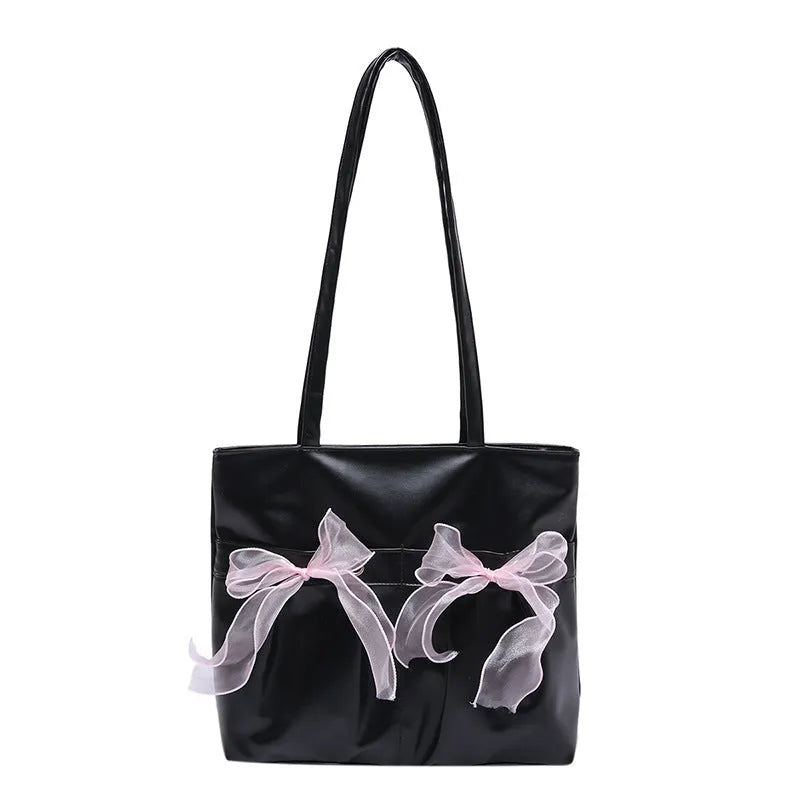 College style bow tote bag in black or pink with double shoulder straps and zippered compartment