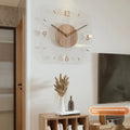 Modern round transparent wall clock with a wooden frame, measuring 35cm by 35cm.