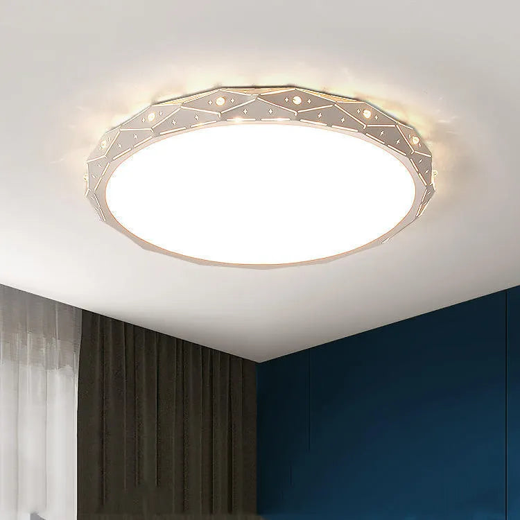 Round modern LED ceiling light with an iron frame in black or white, shown in a room setting.