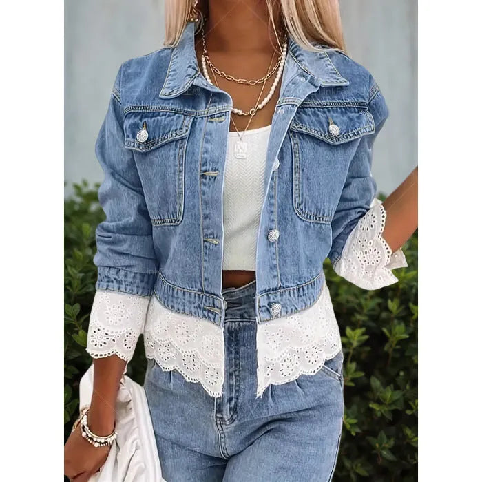 Blue women's denim jacket with decorative lace stitching detail on the front.