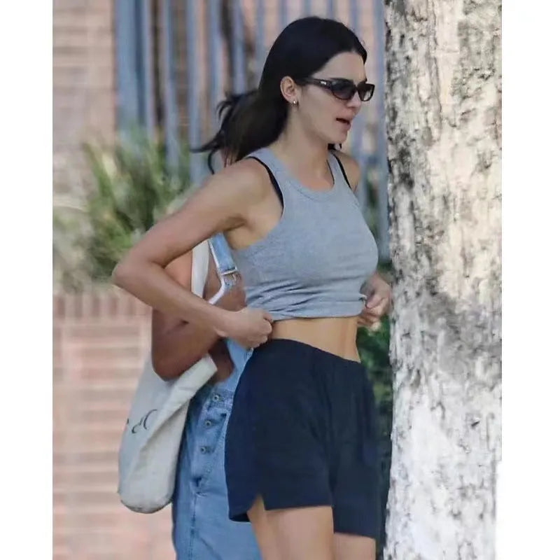 Women's dark blue cotton sports shorts with white flag embroidery and navy blue styling