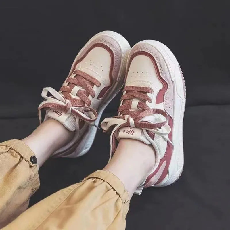 Women's pink and beige low-top height increasing sneakers with rubber soles