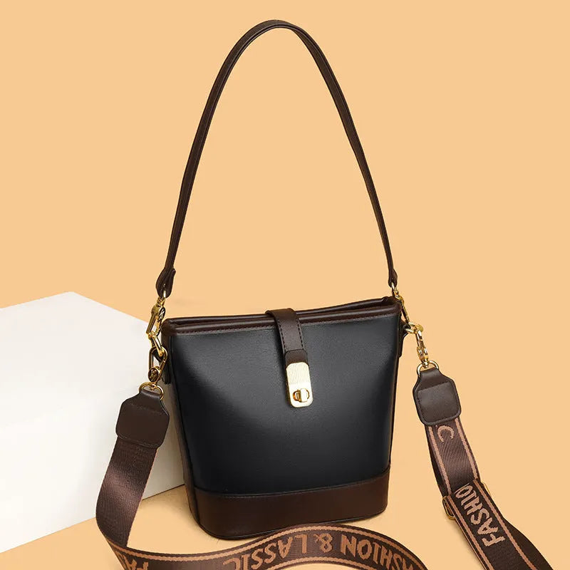 Korean style soft PU bucket messenger bag in black or brown with organised interior compartments