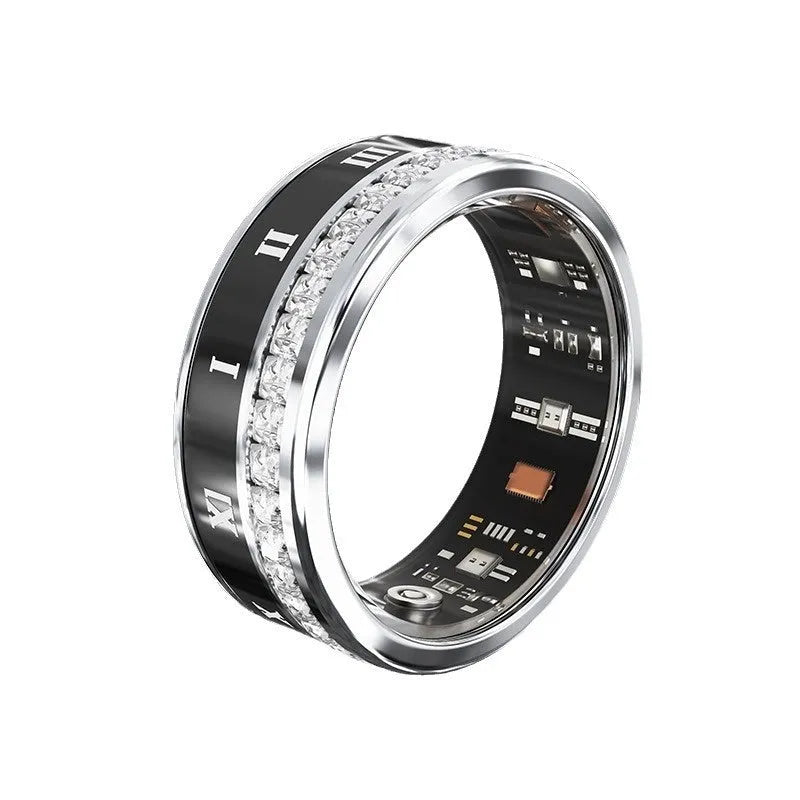 Diamond inlaid smart ring for blood oxygen monitoring in silver and gold colours on a finger.