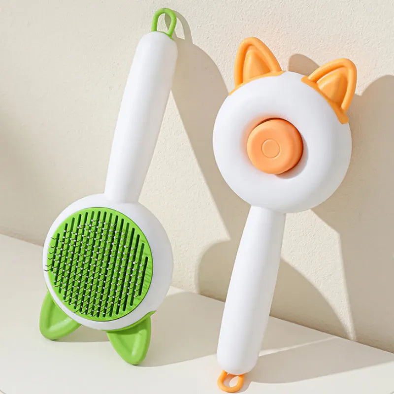 Self-cleaning cat grooming comb with stainless steel pins and rubber massage nodules in greenish white colour