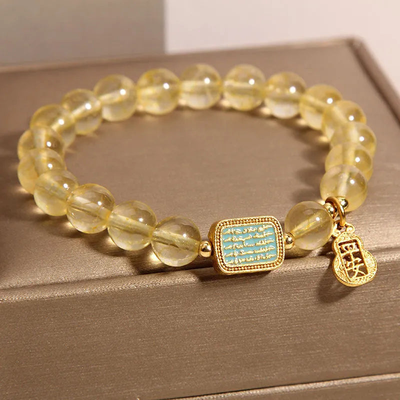 Women's citrine yellow crystal bracelet with rhinestone decorative elements