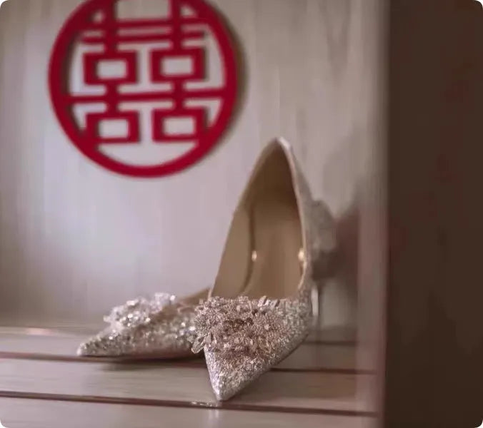 Champagne coloured wedding shoes with crystal design, pointed toes and fine heels