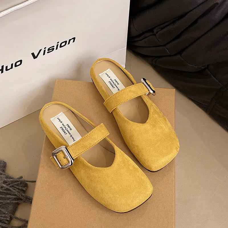Women's flat closed-toe slippers in apricot with square toe, PU upper, and rubber sole.