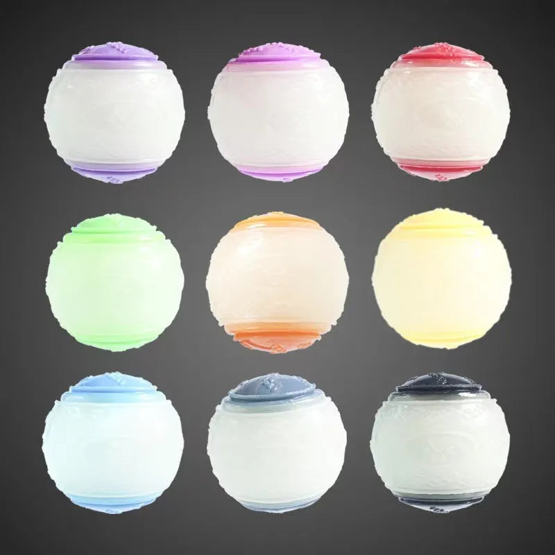 TPR dog chew ball in blue and orange colours showing textured surface and 6.5cm size
