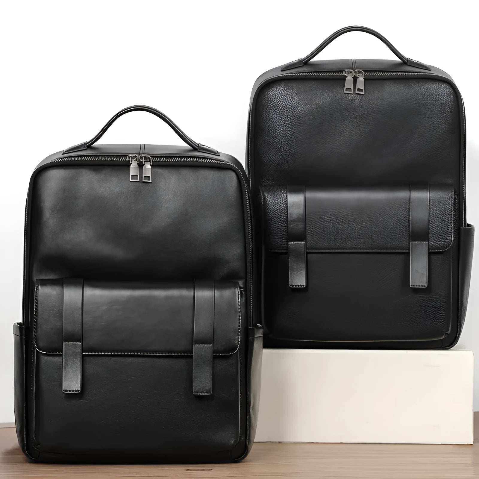 Large black genuine leather men's backpack with woven detail and a curved back panel.