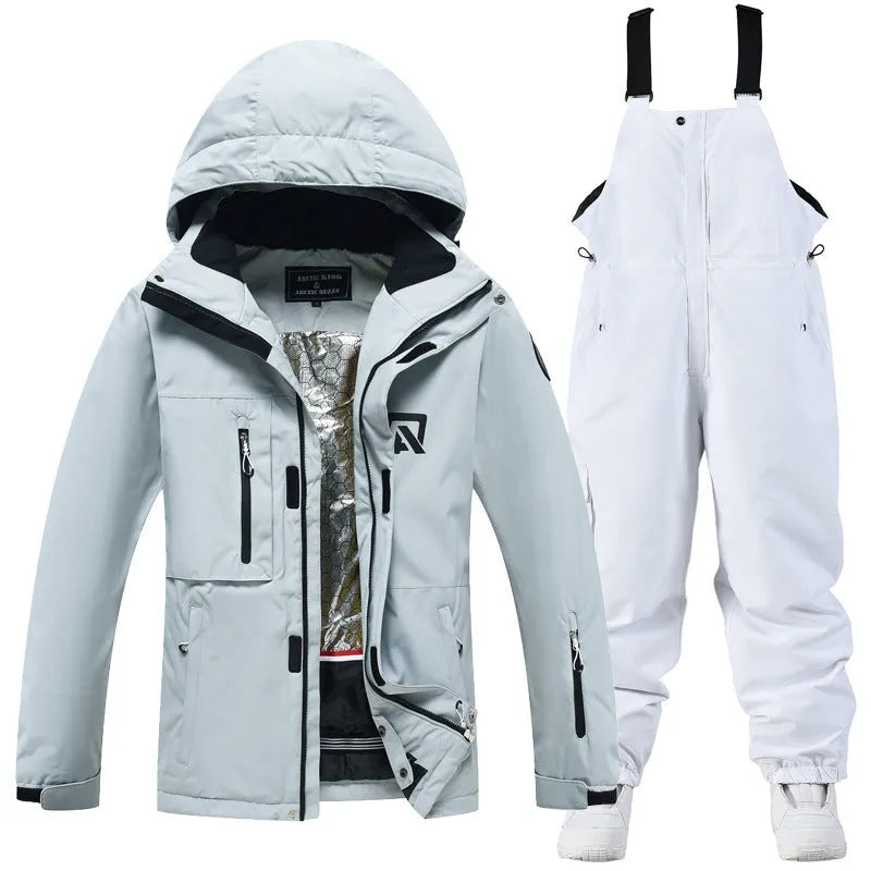Men's and women's waterproof ski suit in blue with black trousers for winter snow sports