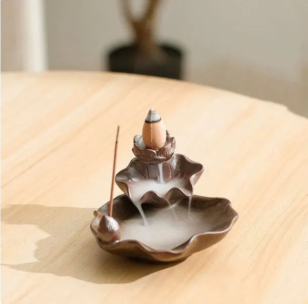 Ceramic reverse flow incense burner with purple clay finish and crystal glaze decorations