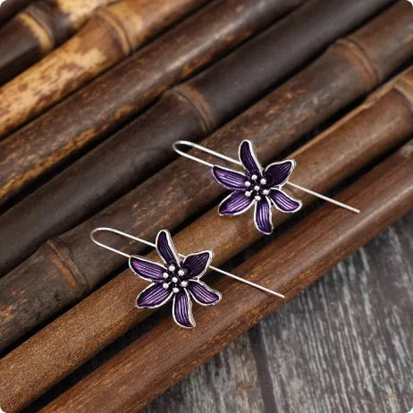 Purple flower-shaped alloy earrings with electroplated finish and retro design