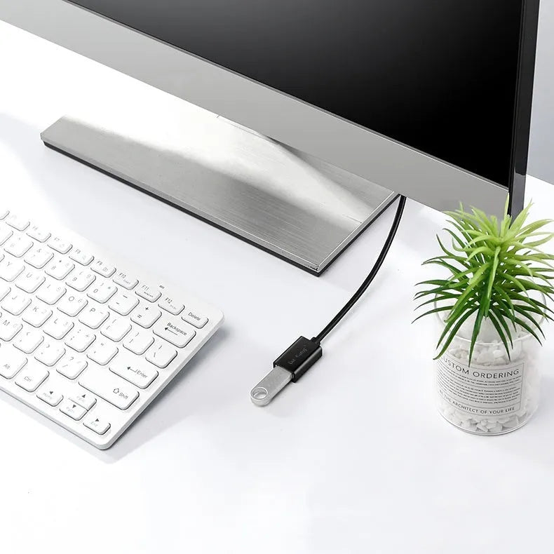 Black USB extension cable with male and female connectors, showing its length and double-shielded construction.