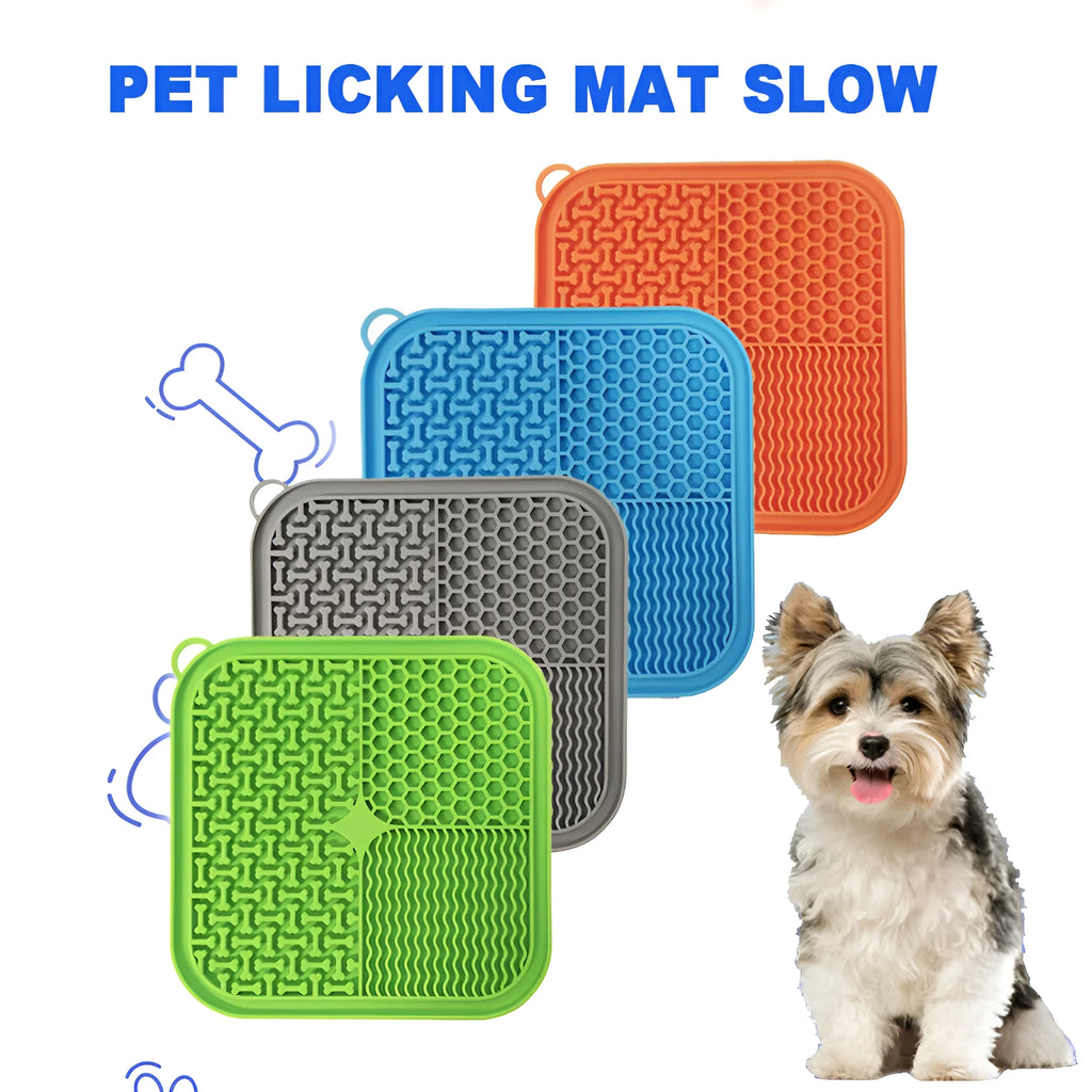 Orange red silicone dog licking mat with suction cups on back for slow feeding and anxiety relief