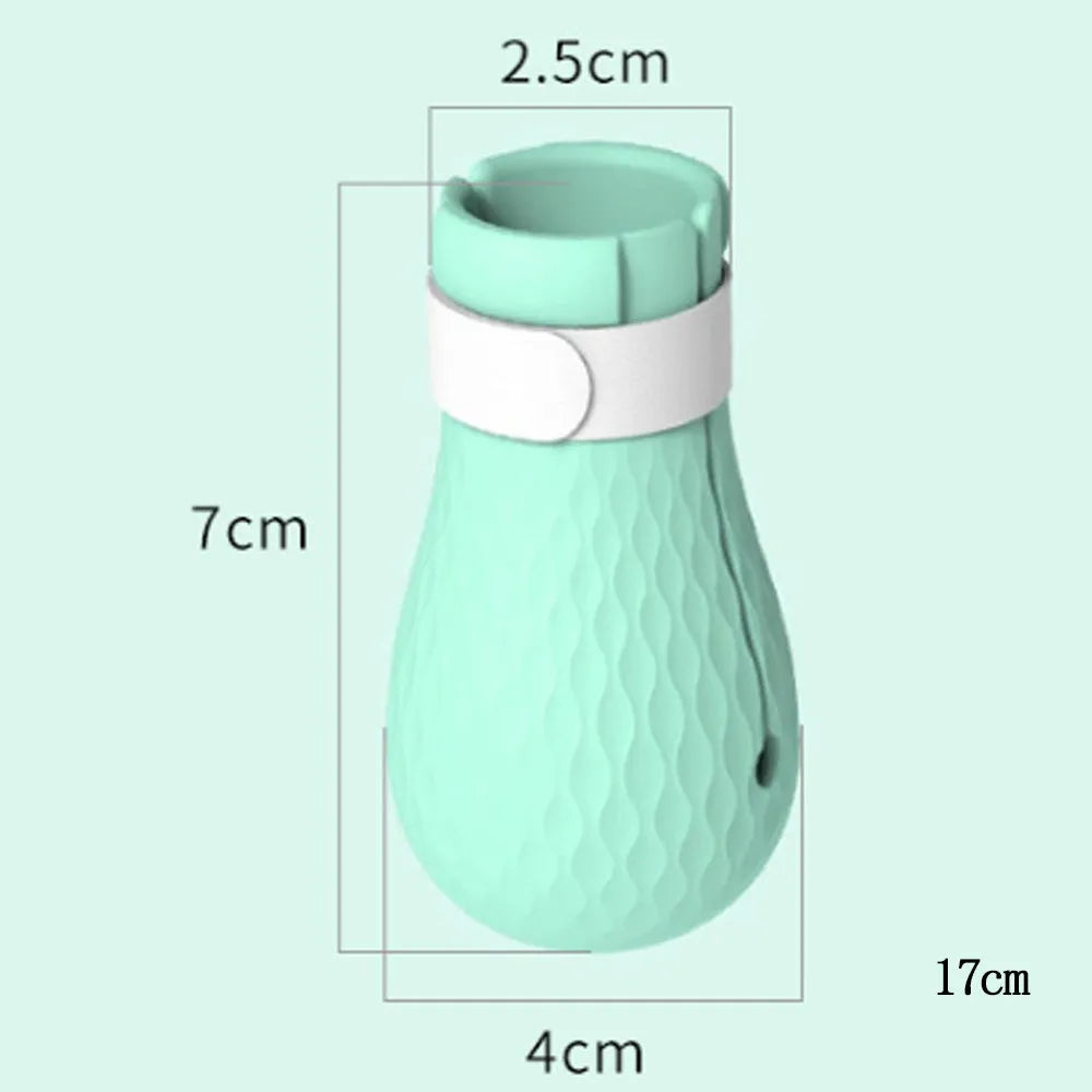 Translucent green silicone cat anti-scratch foot covers for pet handling protection