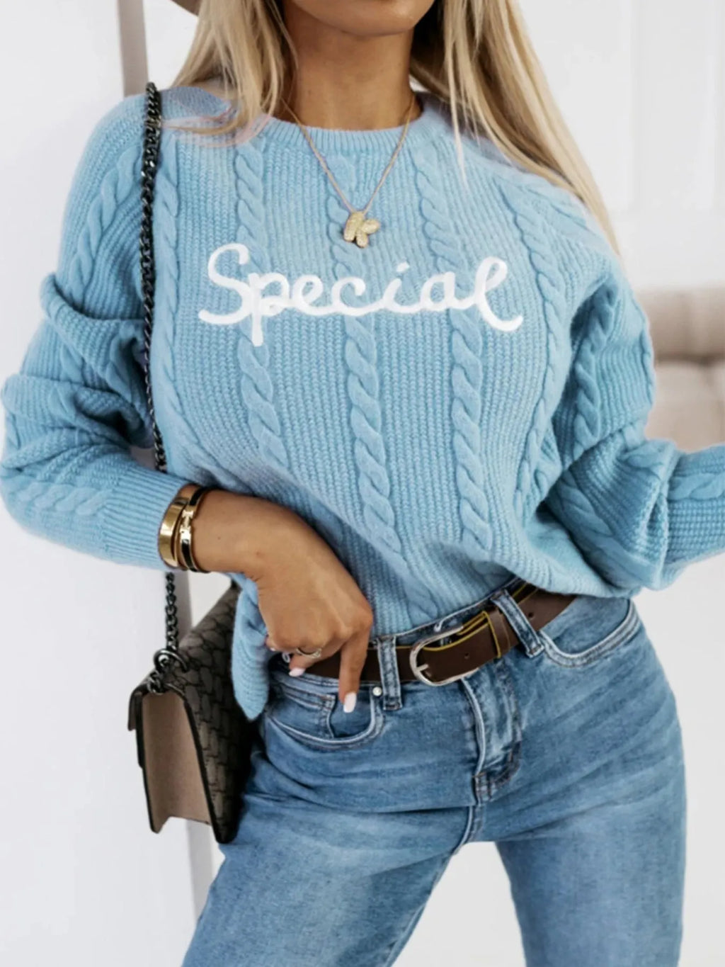 Blue crew neck pullover with white embroidered letters, street fashion style knitwear