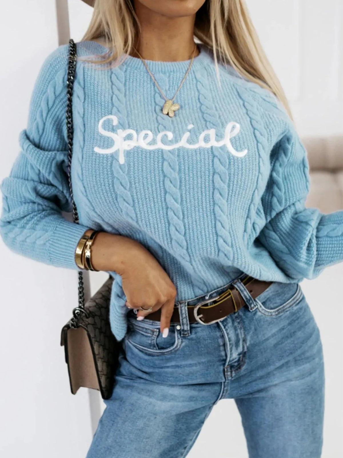 Blue crew neck pullover with white embroidered letters, street fashion style knitwear