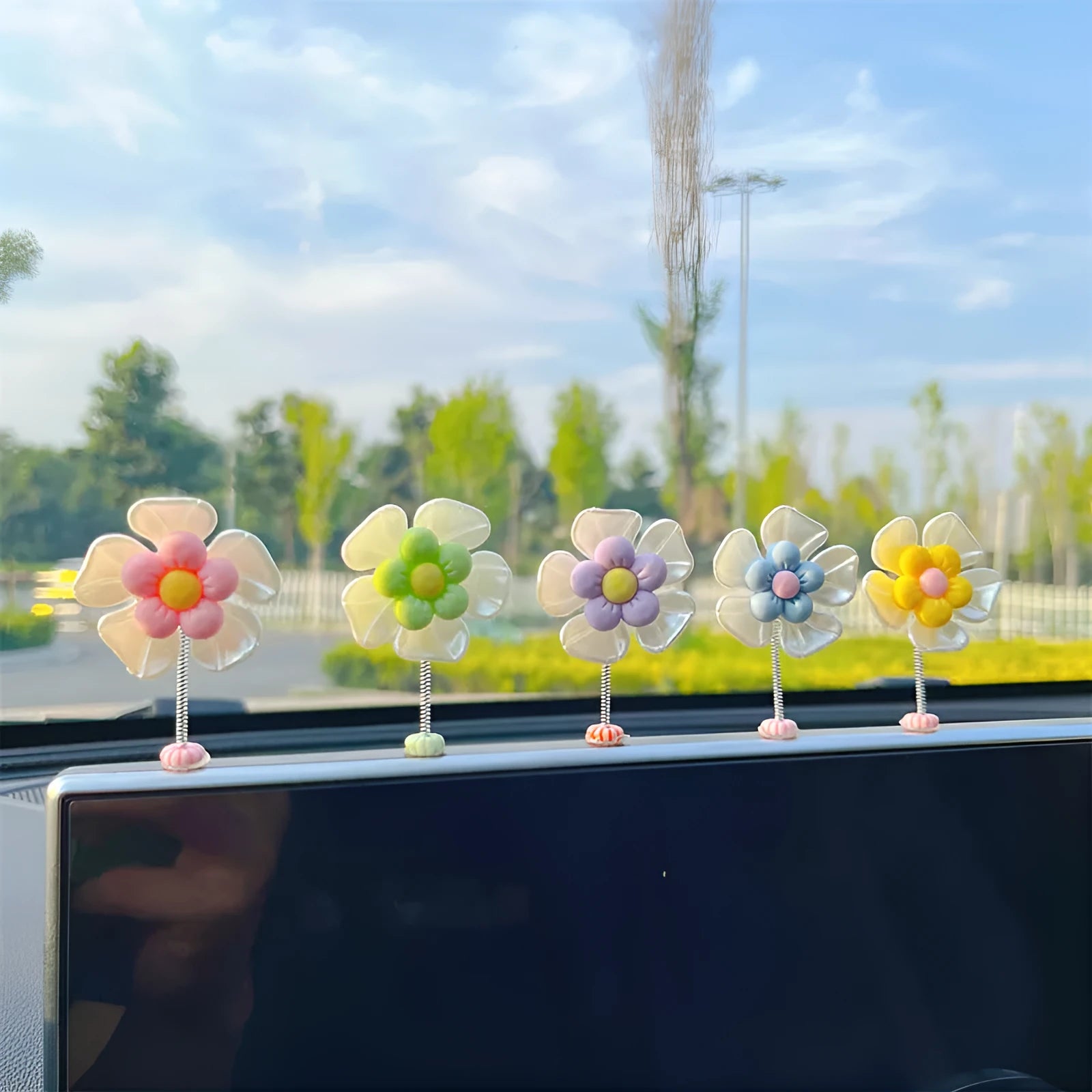 Plastic car decoration ornament with swing design in blue colour showing 5cm height measurement