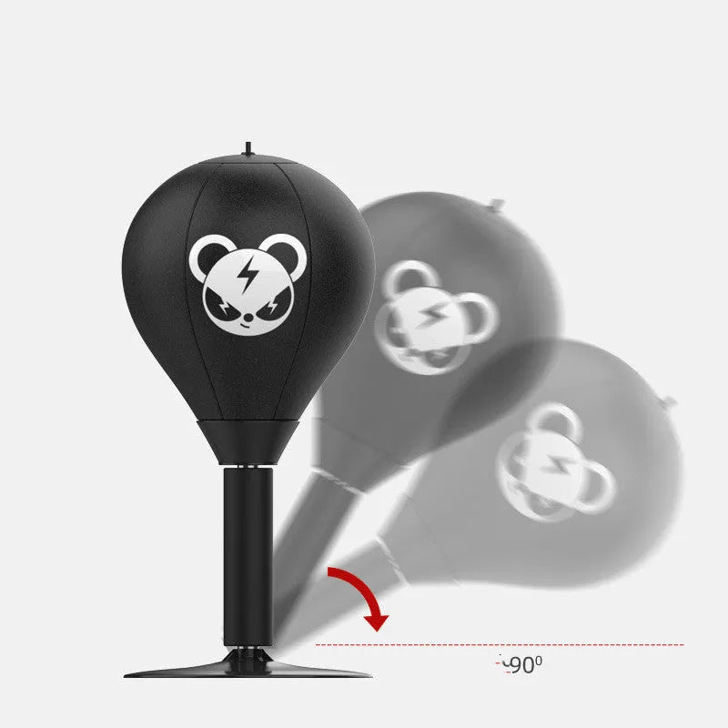 Tabletop boxing speed ball with suction cup base and PU leather inflatable sphere on a desk.