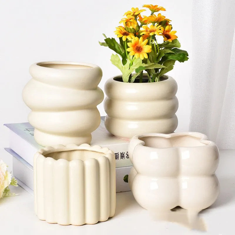 Roman column matte yellow ceramic flower pot with breathable, self-absorbent design.