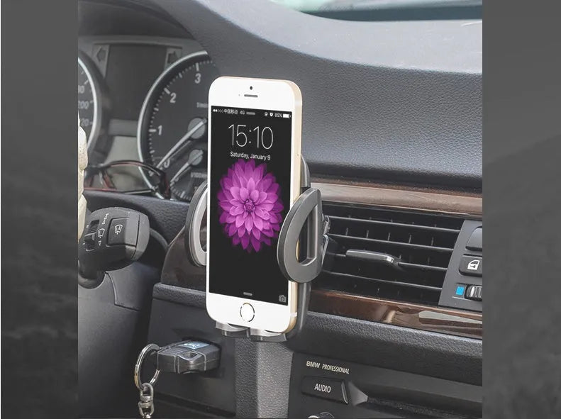 Black car air vent mobile phone holder mounted on vehicle air conditioning outlet