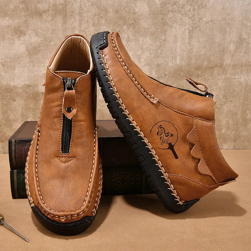 Men's slip-on leather loafers in black with round toe and rubber sole