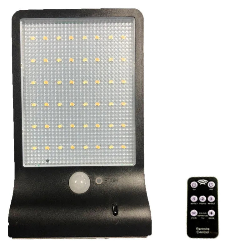 Black and white waterproof solar garden light with LED illumination for outdoor use