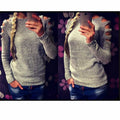 Women's white knitted shirt with hollow-out crochet detail on sleeves and body.