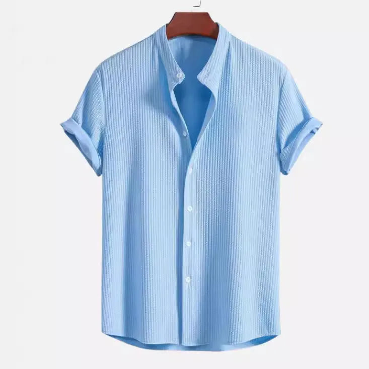 Men's loose short sleeve summer shirt in multiple colours on a hanger.