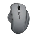 Grey and black self-charging wireless optical mouse for laptop computers with USB receiver and charging cable.