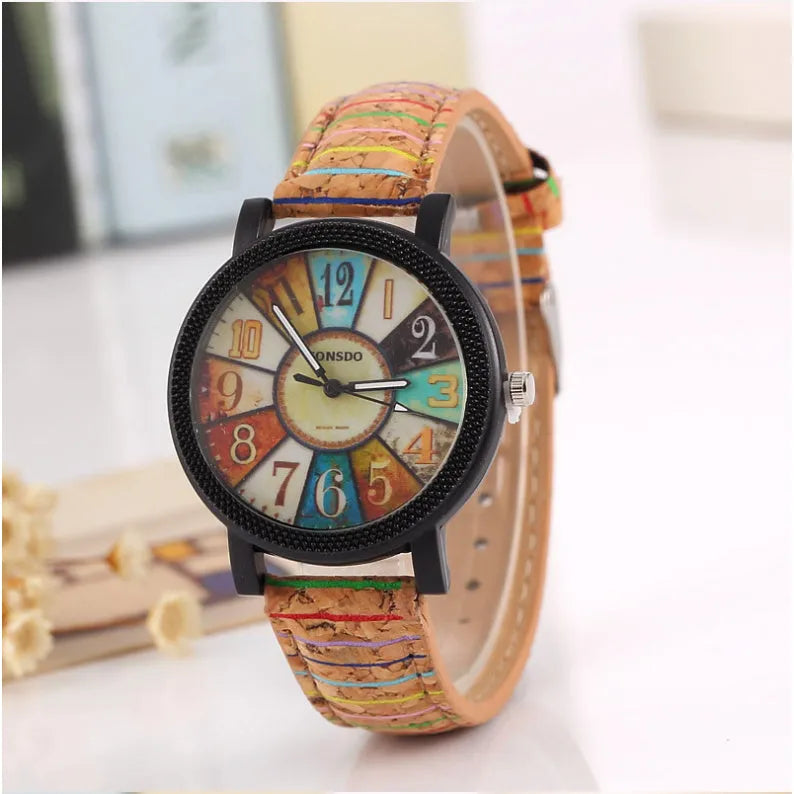 Women's vintage quartz wrist watch with brown leather strap and 37mm round dial