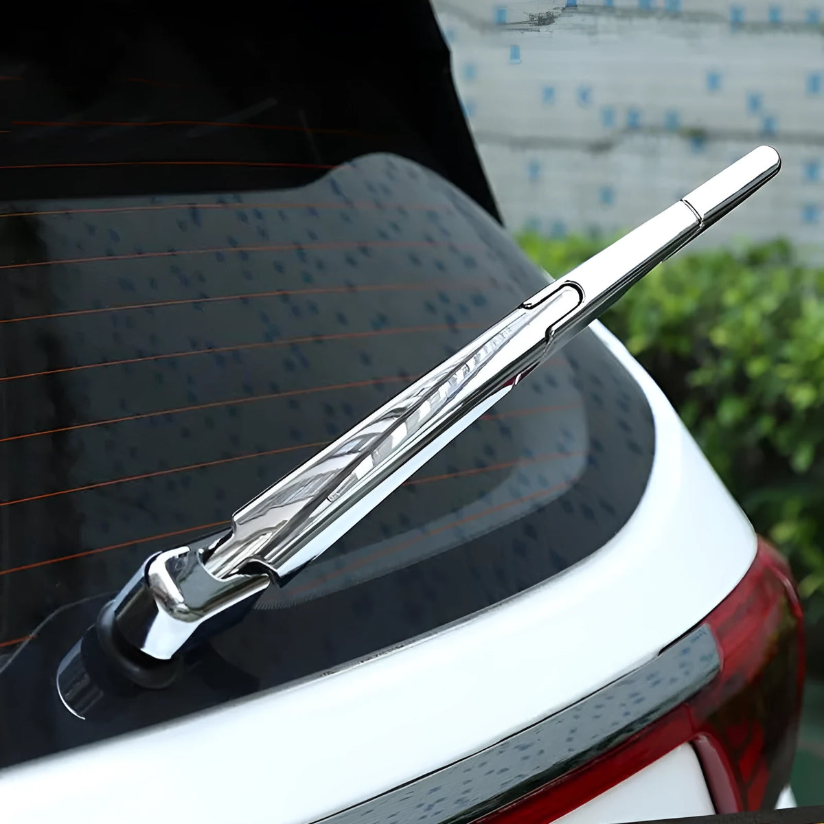 Set of four silvery ABS plastic rear wiper cover trims for a 2010 Hyundai.