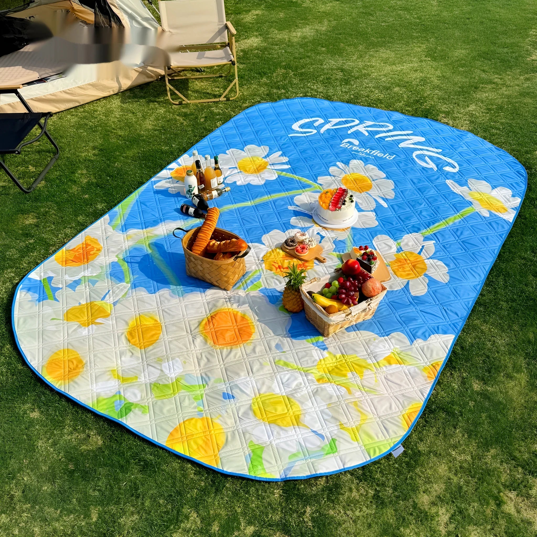 Waterproof picnic mat with brushed fabric texture shown in seasonal colour options