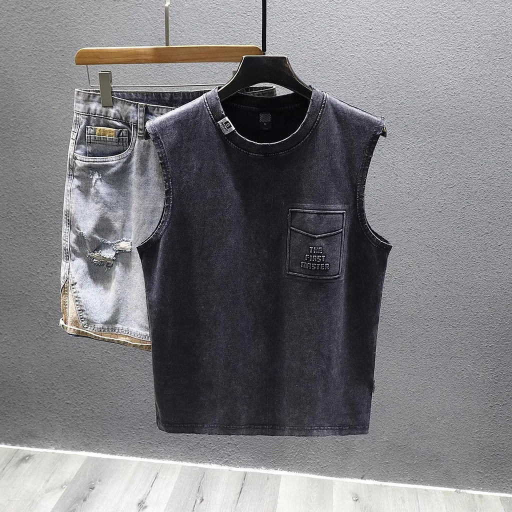 Cotton sleeveless t-shirt in loose fit with straight hem, available in white or black colours
