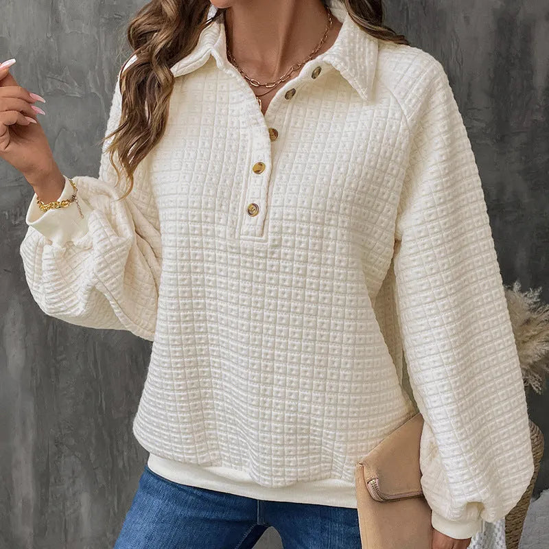 Women's milky white polo collar sweater with long sleeves and textured knit.