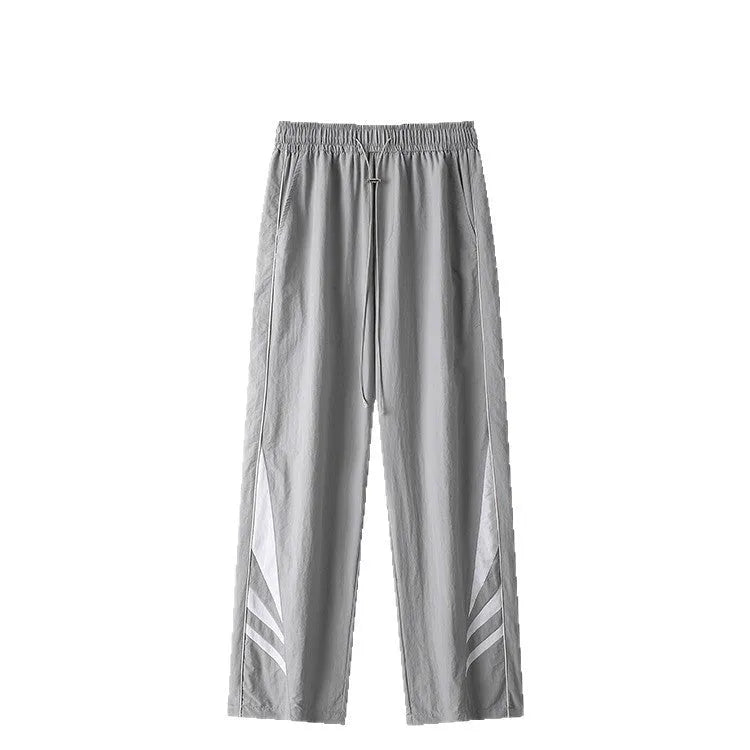 Men's straight leg casual trousers in grey with elastic waistband and button fly
