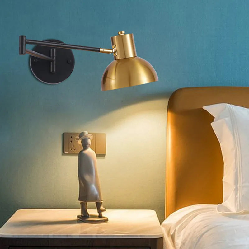 Modern minimalist double-section adjustable rocker arm wall lamp mounted on a wall.