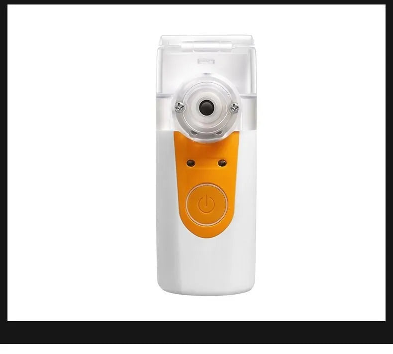 White columnar plastic USB handheld nebuliser spray machine with water tank on a table.