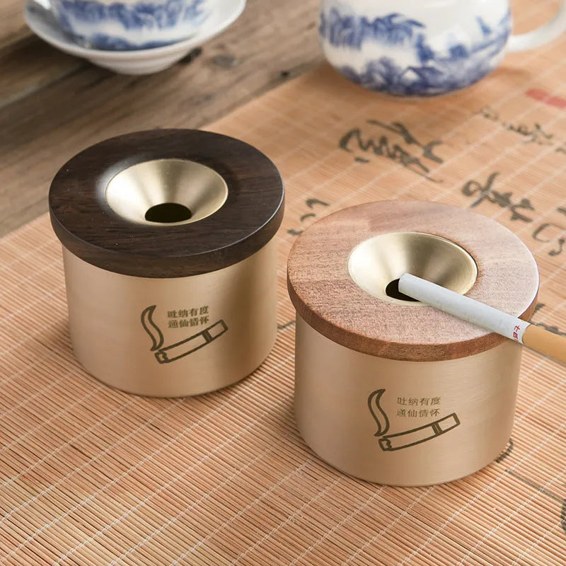 Retro solid copper ashtray with a wooden lid showing the centre hole.