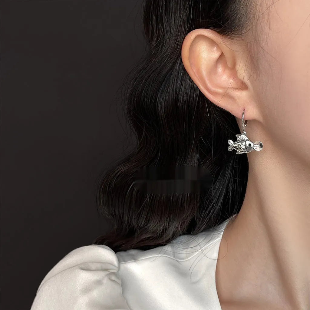 Pair of copper Bubble Fish earrings with goldfish animal modelling and electroplated finish.