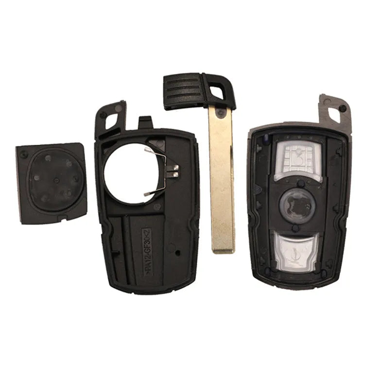 BMW semi-intelligent remote car key with three keys showing metal-plastic construction