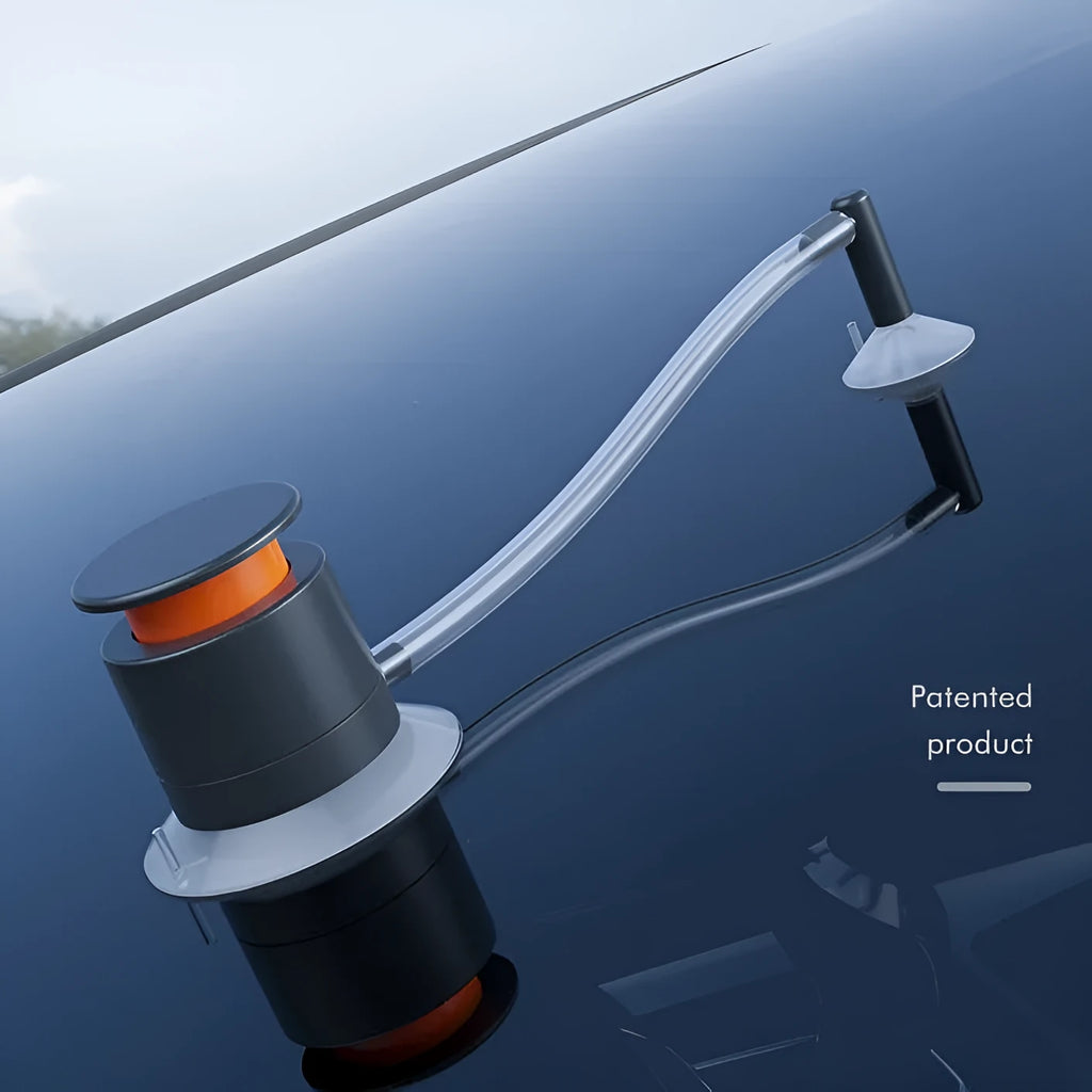 Plastic car windscreen crack repair tool and DIY stone chip repair kit on a flat surface.