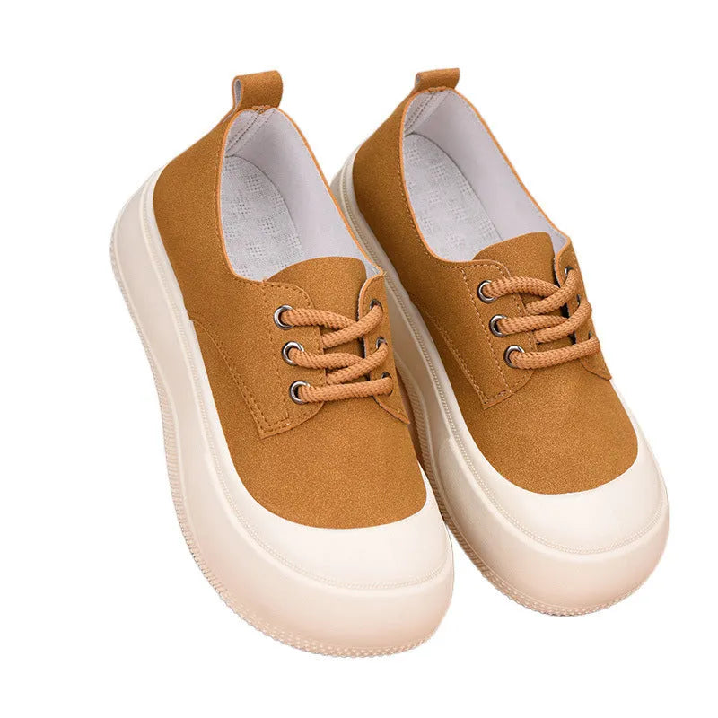 Women's camel suede platform loafers with round toe, flat heel, and front lace-up.