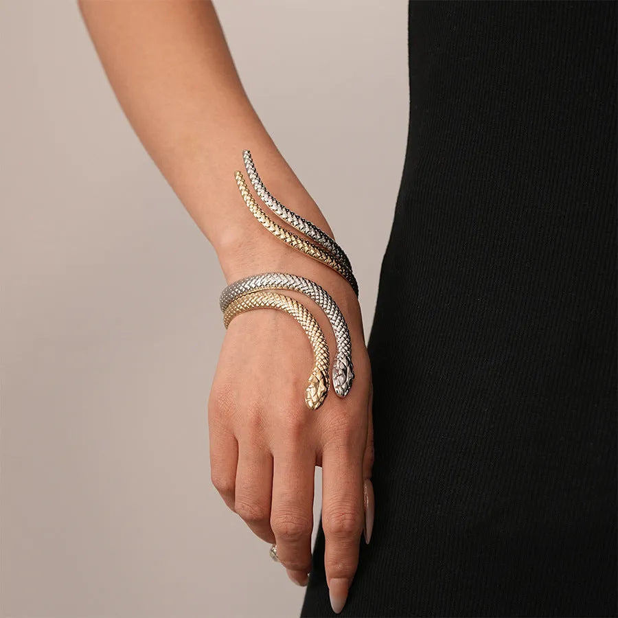 Gold and silver tone snake motif ring and bracelet set with twisted winding design