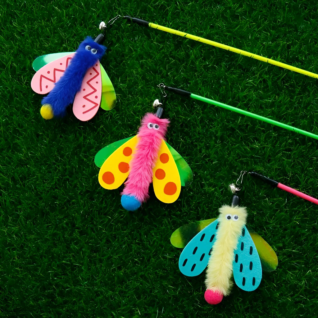 Blue yellow and pink cat teaser wand with dragonfly attachment and bell on a 49cm stick.