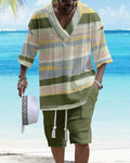 Man wearing a loose-fitting short sleeve top and matching casual shorts from a polyester suit set.