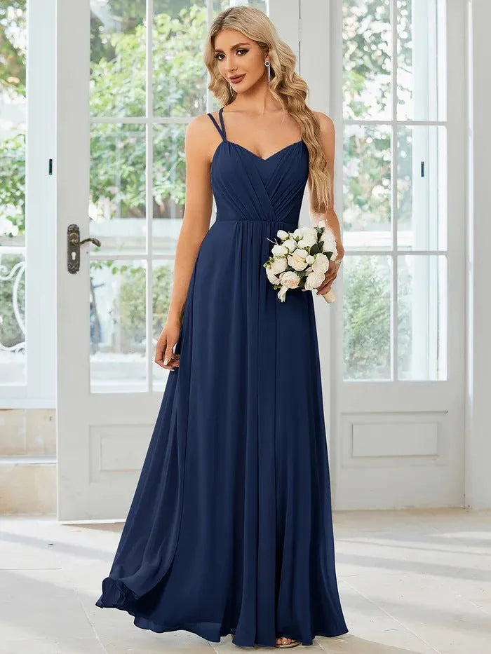 Sleeveless sling neckline banquet dress with long pleated A-line skirt in light green colour