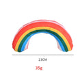 Striped pattern cat pillow toy in green, rainbow, or yellow, showing dimensions of 23cm by 20cm.